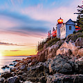 Bass Harbor Head lighthouse at sunset, in Maine